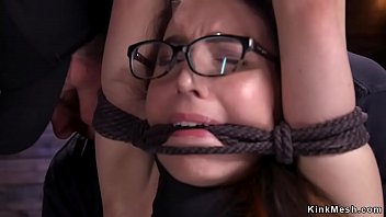 In frog bondage position sexy brunette slave gets pussy vibrated and finger fucked by master